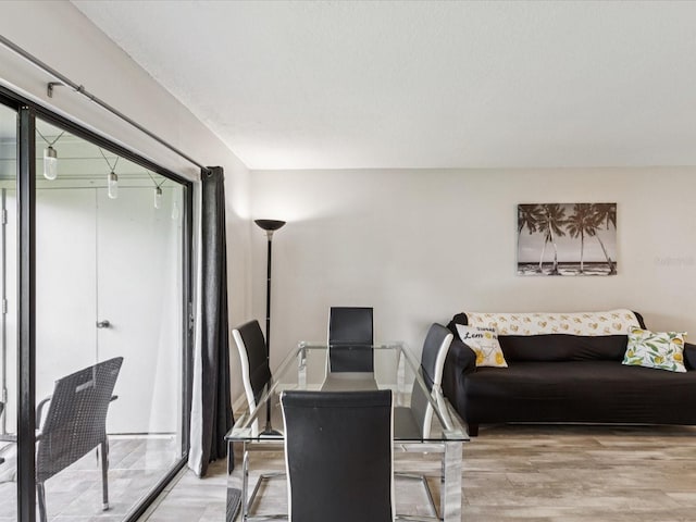 214 Meadow Ln Unit 214, Oldsmar, FL 34677 - dining area featuring light wood-style floors