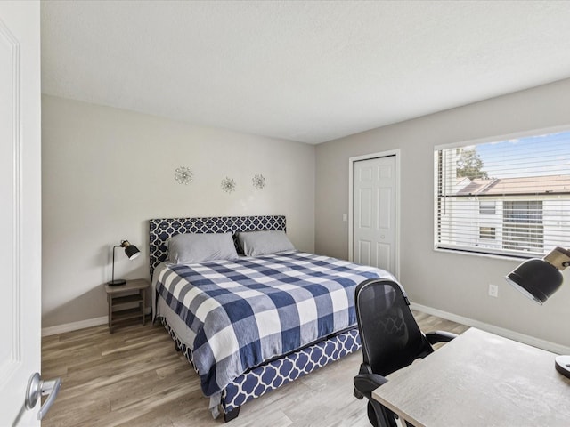 214 Meadow Ln Unit 214, Oldsmar, FL 34677 - bedroom featuring wood finished floors