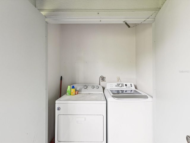 214 Meadow Ln Unit 214, Oldsmar, FL 34677 - washroom with separate washer and dryer