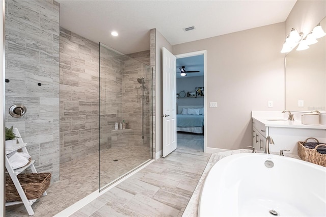 12646 Oak Hill Way, Parrish, FL 34219 - ensuite bathroom with walk in shower, vanity, a bath, ceiling fan, and recessed lighting