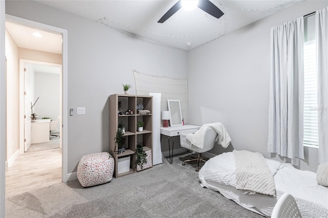 12646 Oak Hill Way, Parrish, FL 34219 - bedroom featuring carpet floors, ceiling fan, and an office area