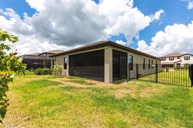 12646 Oak Hill Way, Parrish, FL 34219 - back of house featuring a sunroom and stucco siding