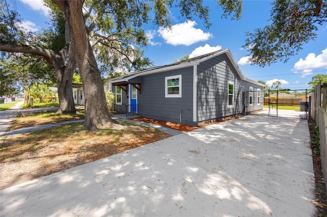 2859 38th Ave N, Saint Petersburg, FL 33713 - view of front of property featuring a gate and concrete driveway