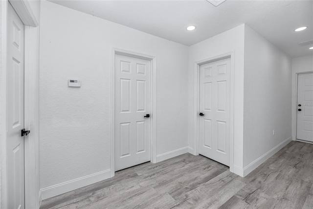2859 38th Ave N, Saint Petersburg, FL 33713 - hall with light wood-style floors and recessed lighting