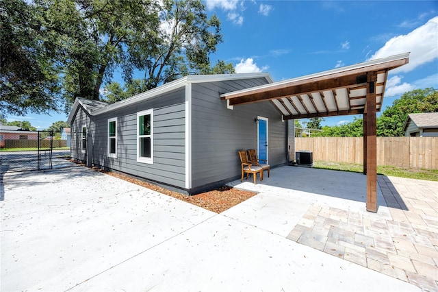 2859 38th Ave N, Saint Petersburg, FL 33713 - view of property exterior with driveway and an attached carport