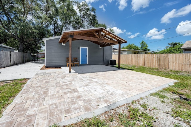 2859 38th Ave N, Saint Petersburg, FL 33713 - fenced backyard featuring a patio area and a carport