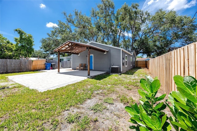 2859 38th Ave N, Saint Petersburg, FL 33713 - fenced backyard with a patio and a carport