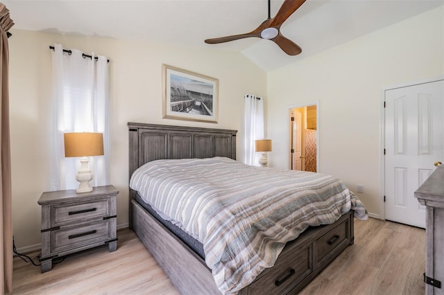 37147 Foxrun Pl, Zephyrhills, FL 33542 - bedroom featuring vaulted ceiling, light wood finished floors, and ceiling fan