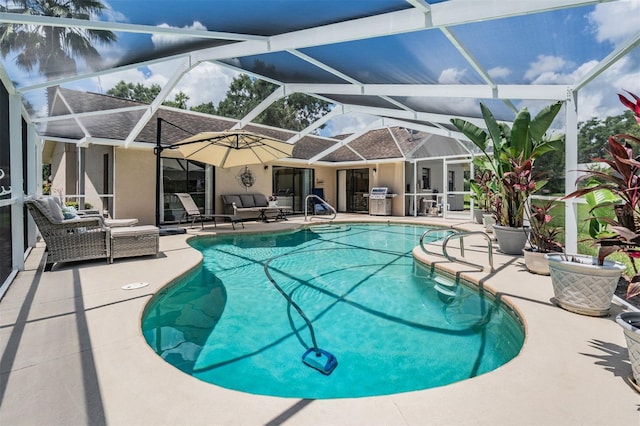 37147 Foxrun Pl, Zephyrhills, FL 33542 - swimming pool featuring a patio and a grill