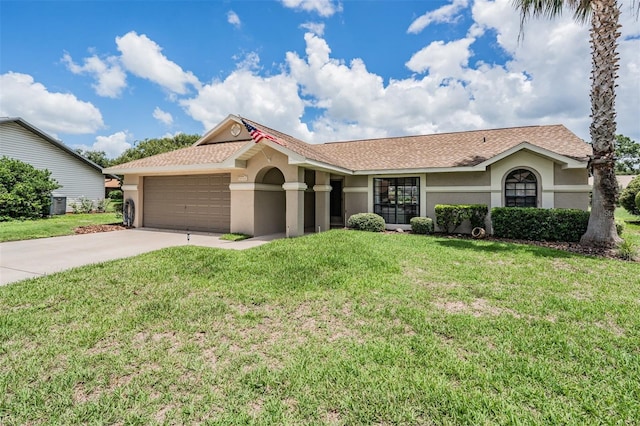 37147 Foxrun Pl, Zephyrhills, FL 33542 - single story home with stucco siding, an attached garage, driveway, and a front lawn