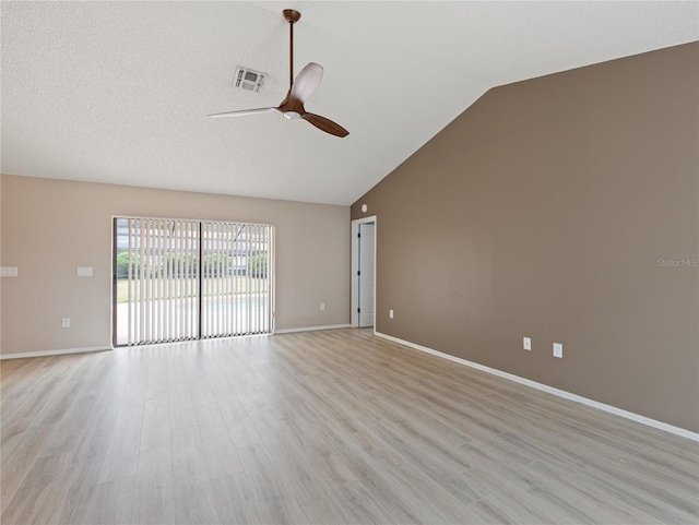 37147 Foxrun Pl, Zephyrhills, FL 33542 - unfurnished room featuring a ceiling fan, light wood-style flooring, and high vaulted ceiling