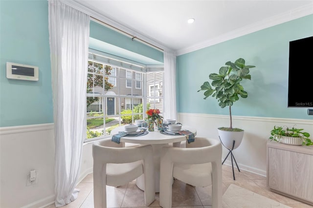 2809 W Platt St Unit 6, Tampa, FL 33609 - dining room featuring plenty of natural light, ornamental molding, and light tile patterned floors