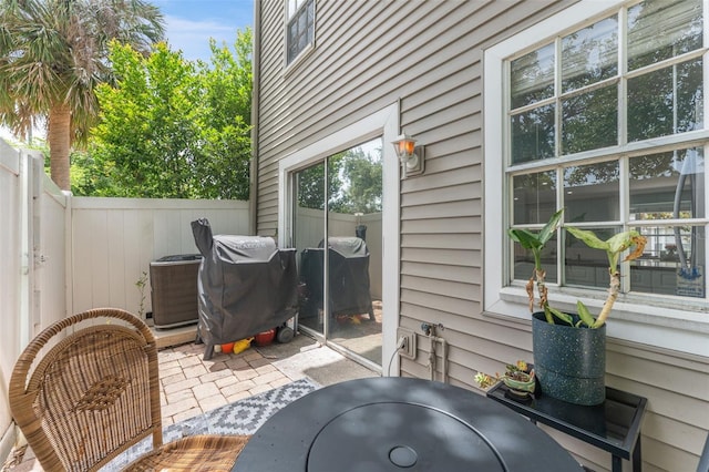 2809 W Platt St Unit 6, Tampa, FL 33609 - fenced backyard with a patio and grilling area