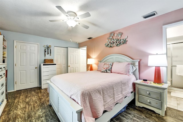 2700 Bayshore Blvd Unit 544, Dunedin, FL 34698 - bedroom with dark wood-style floors, a ceiling fan, and a closet