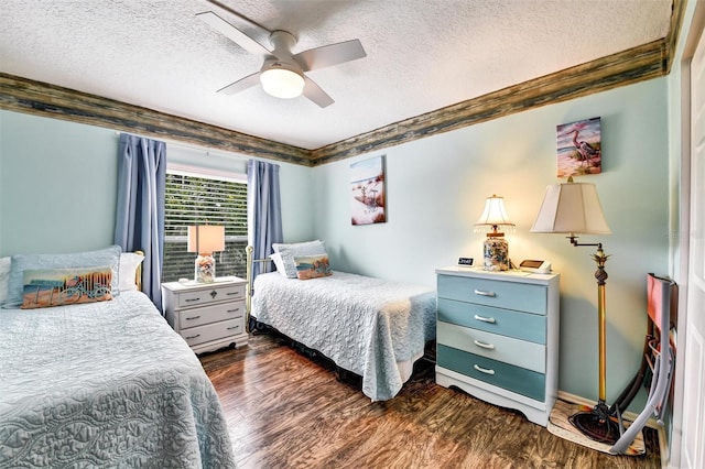 2700 Bayshore Blvd Unit 544, Dunedin, FL 34698 - bedroom with a textured ceiling, dark wood finished floors, ornamental molding, and ceiling fan