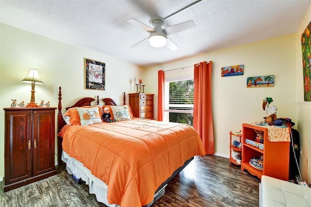 2700 Bayshore Blvd Unit 544, Dunedin, FL 34698 - bedroom with a textured ceiling, wood finished floors, and ceiling fan
