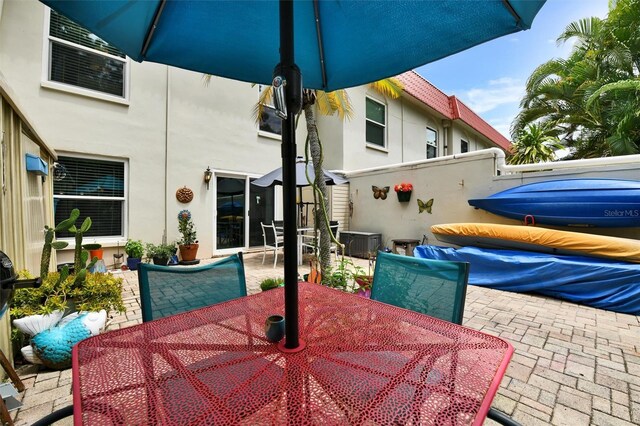 2700 Bayshore Blvd Unit 544, Dunedin, FL 34698 - view of patio with outdoor dining area