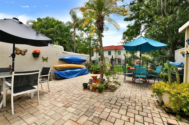 2700 Bayshore Blvd Unit 544, Dunedin, FL 34698 - view of patio / terrace featuring outdoor dining space