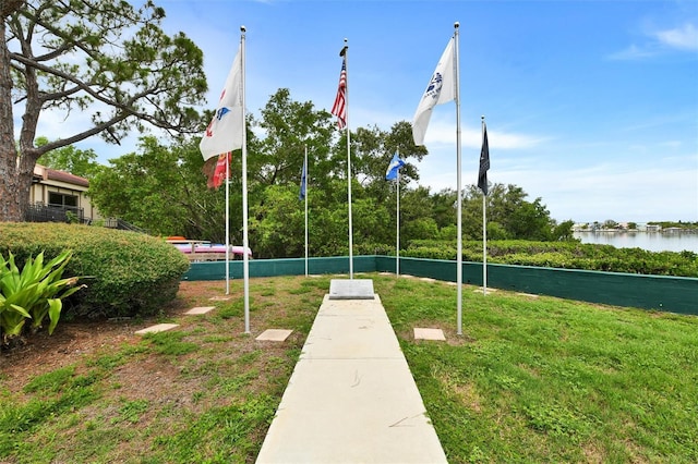 2700 Bayshore Blvd Unit 544, Dunedin, FL 34698 - surrounding community with a yard and a water view