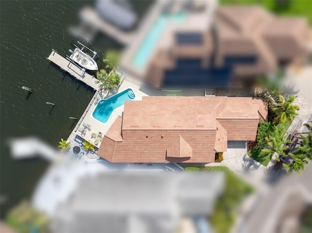 835 Symphony Isles Blvd, Apollo Beach, FL 33572 - drone / aerial view of a pool area