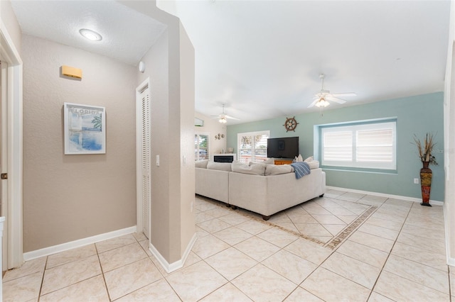 835 Symphony Isles Blvd, Apollo Beach, FL 33572 - living room featuring a ceiling fan and light tile patterned flooring