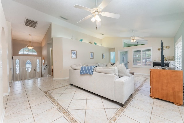 835 Symphony Isles Blvd, Apollo Beach, FL 33572 - living area featuring light tile patterned flooring, a ceiling fan, inlaid floor details, and high vaulted ceiling