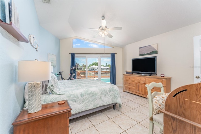 835 Symphony Isles Blvd, Apollo Beach, FL 33572 - bedroom featuring access to exterior, light tile patterned flooring, vaulted ceiling, and ceiling fan