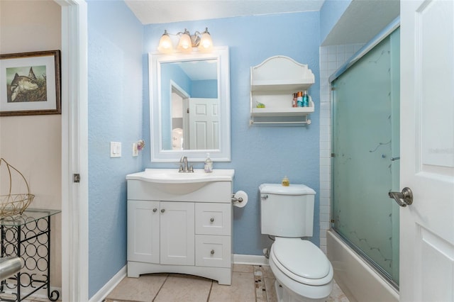 835 Symphony Isles Blvd, Apollo Beach, FL 33572 - bathroom featuring vanity, tile patterned floors, and enclosed tub / shower combo