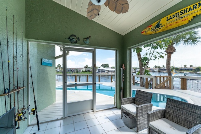 835 Symphony Isles Blvd, Apollo Beach, FL 33572 - sunroom featuring lofted ceiling and a water view