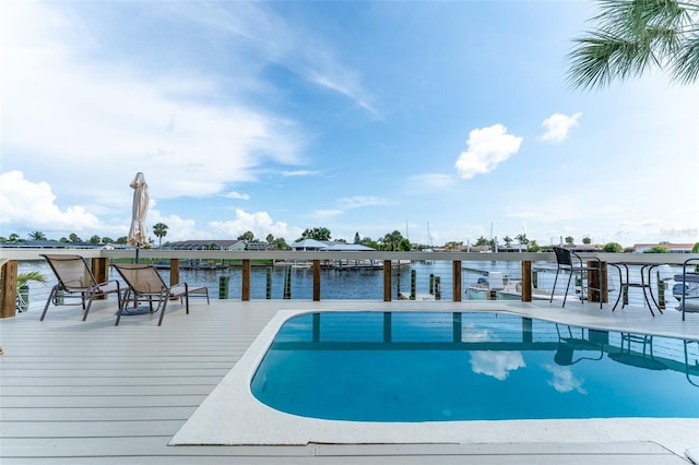 835 Symphony Isles Blvd, Apollo Beach, FL 33572 - swimming pool featuring a water view and a boat dock