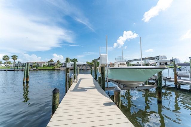 835 Symphony Isles Blvd, Apollo Beach, FL 33572 - dock with boat lift and a water view