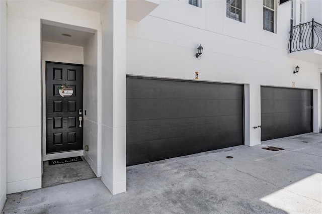 3210 W Horatio St Unit 9, Tampa, FL 33609 - view of exterior entry with a garage