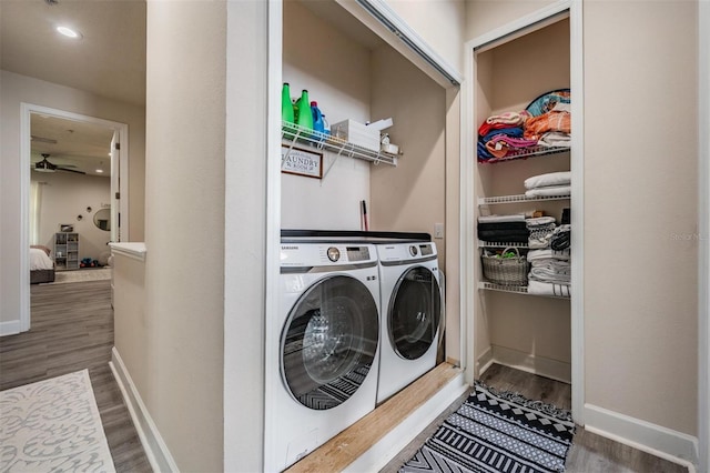 3210 W Horatio St Unit 9, Tampa, FL 33609 - washroom featuring washer and dryer, wood finished floors, and a ceiling fan