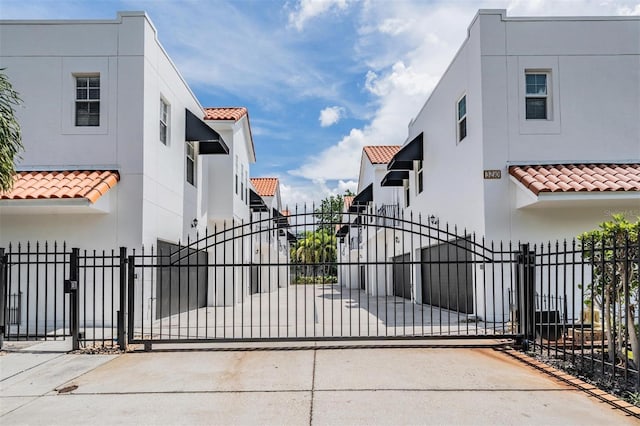 3210 W Horatio St Unit 9, Tampa, FL 33609 - gate with a fenced front yard