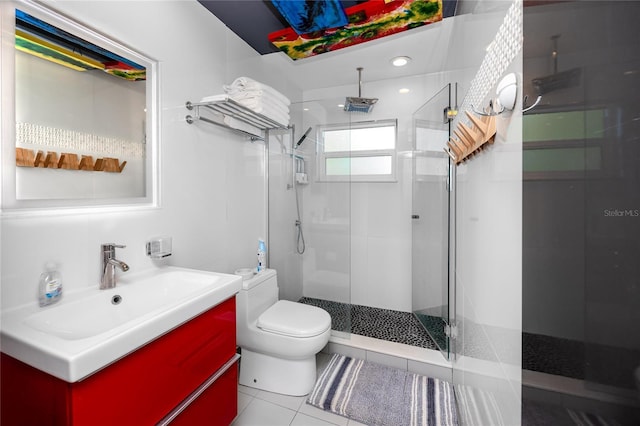 4050 4th St N Unit 116, Saint Petersburg, FL 33703 - bathroom featuring a shower stall, vanity, and tile patterned flooring