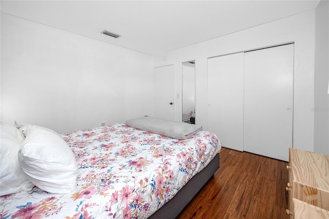 4050 4th St N Unit 116, Saint Petersburg, FL 33703 - bedroom featuring wood finished floors and a closet