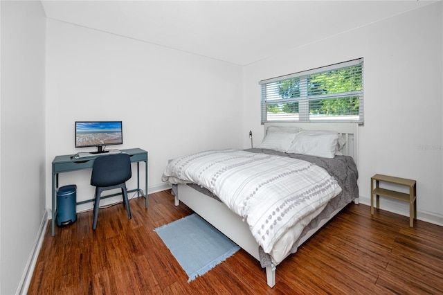 4050 4th St N Unit 116, Saint Petersburg, FL 33703 - bedroom featuring wood finished floors and baseboards