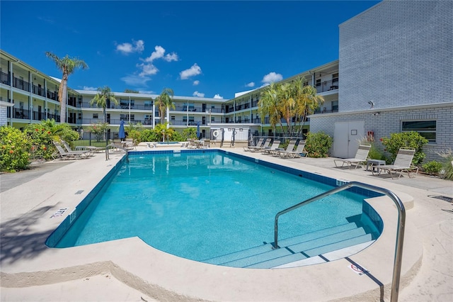 4050 4th St N Unit 116, Saint Petersburg, FL 33703 - community pool with a patio