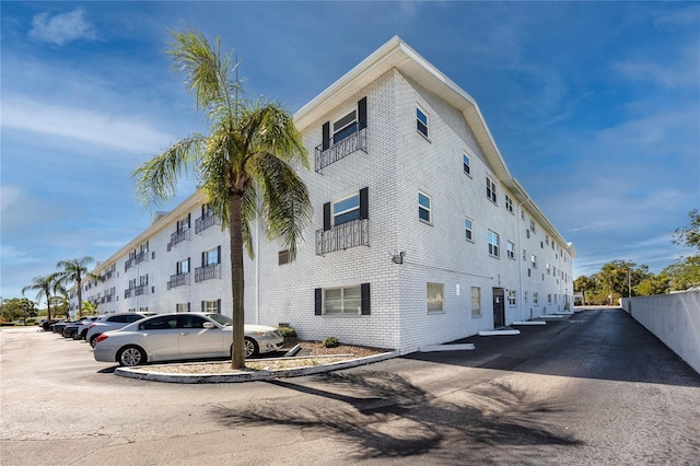 4050 4th St N Unit 116, Saint Petersburg, FL 33703 - view of property with uncovered parking