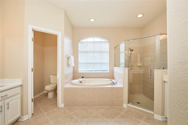15412 Carrillon Estates Blvd, Tampa, FL 33625 - bathroom featuring a garden tub, a stall shower, vanity, and tile patterned flooring