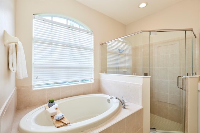 15412 Carrillon Estates Blvd, Tampa, FL 33625 - bathroom featuring healthy amount of natural light, a shower stall, a garden tub, and recessed lighting