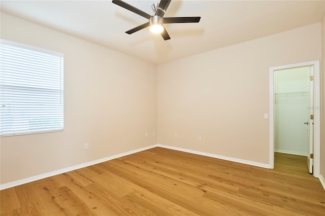 15412 Carrillon Estates Blvd, Tampa, FL 33625 - unfurnished room featuring light wood finished floors and a ceiling fan