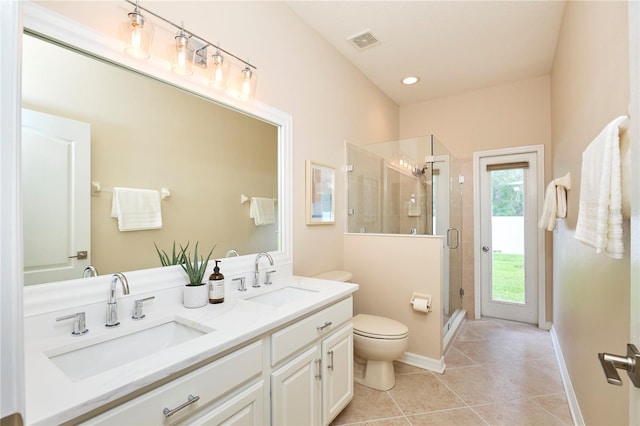 15412 Carrillon Estates Blvd, Tampa, FL 33625 - bathroom with double vanity, tile patterned floors, and a stall shower