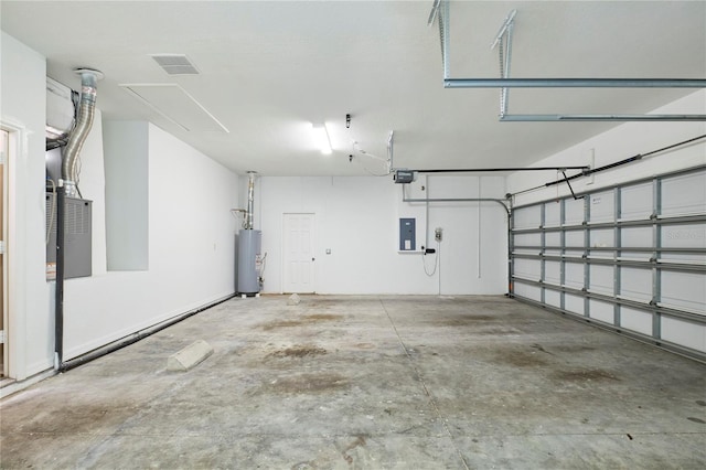 15412 Carrillon Estates Blvd, Tampa, FL 33625 - garage featuring a garage door opener, water heater, and electric panel