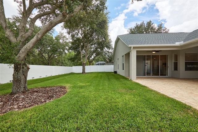 15412 Carrillon Estates Blvd, Tampa, FL 33625 - view of yard with a patio and ceiling fan