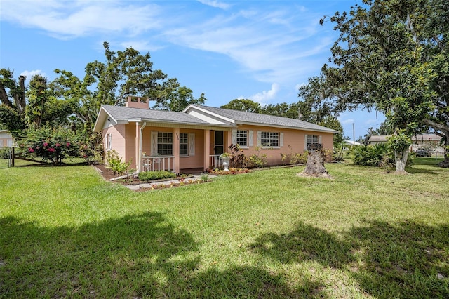 235 Old Welcome Rd, Lithia, FL 33547 - ranch-style house with covered porch and a front lawn