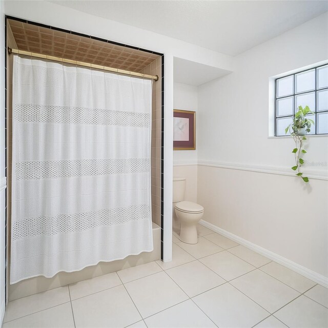 235 Old Welcome Rd, Lithia, FL 33547 - full bath featuring shower / bath combination with curtain and tile patterned flooring