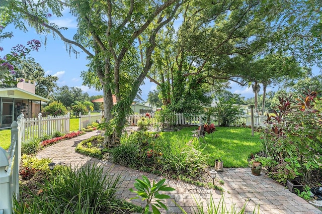 235 Old Welcome Rd, Lithia, FL 33547 - fenced backyard featuring a sunroom