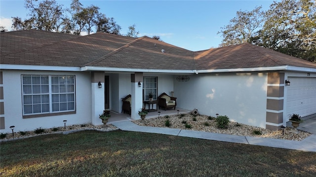 270 Planter Rd, Spring Hill, FL 34606 - single story home with a garage, stucco siding, roof with shingles, and a front lawn