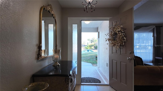 270 Planter Rd, Spring Hill, FL 34606 - entryway with a textured wall and light tile patterned floors